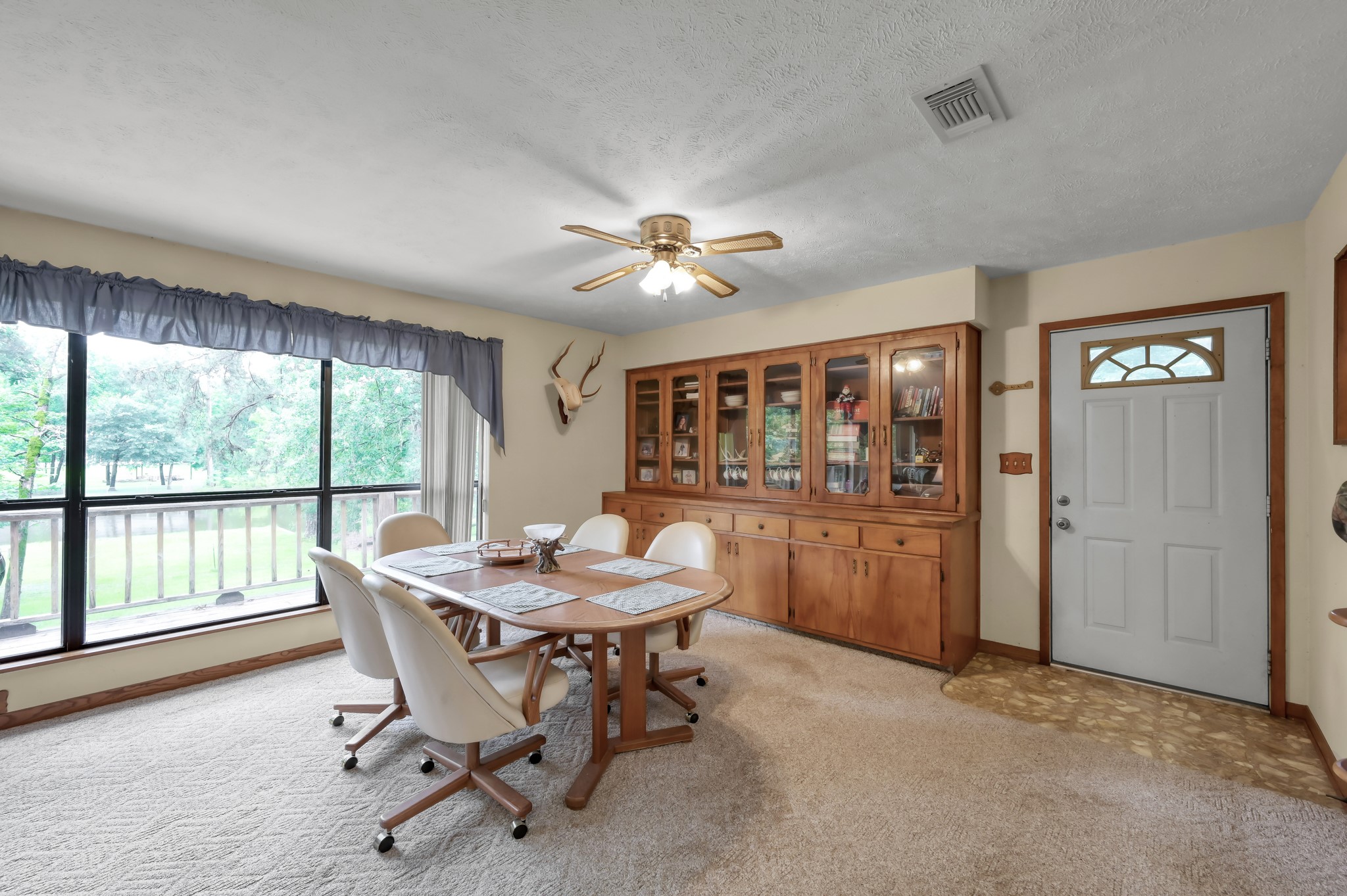 254 Sharp Lane Trinity, TX 75862 - Photo 9 of 36 a dining room with furniture and window