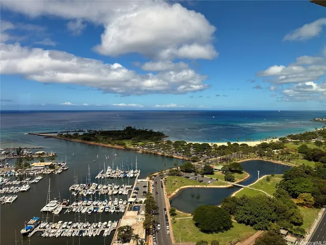 a view of a lake with a city