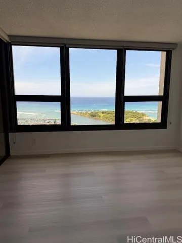 a view of an empty room with a window