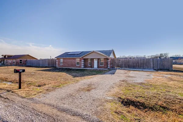 a swimming pool with wooden fence