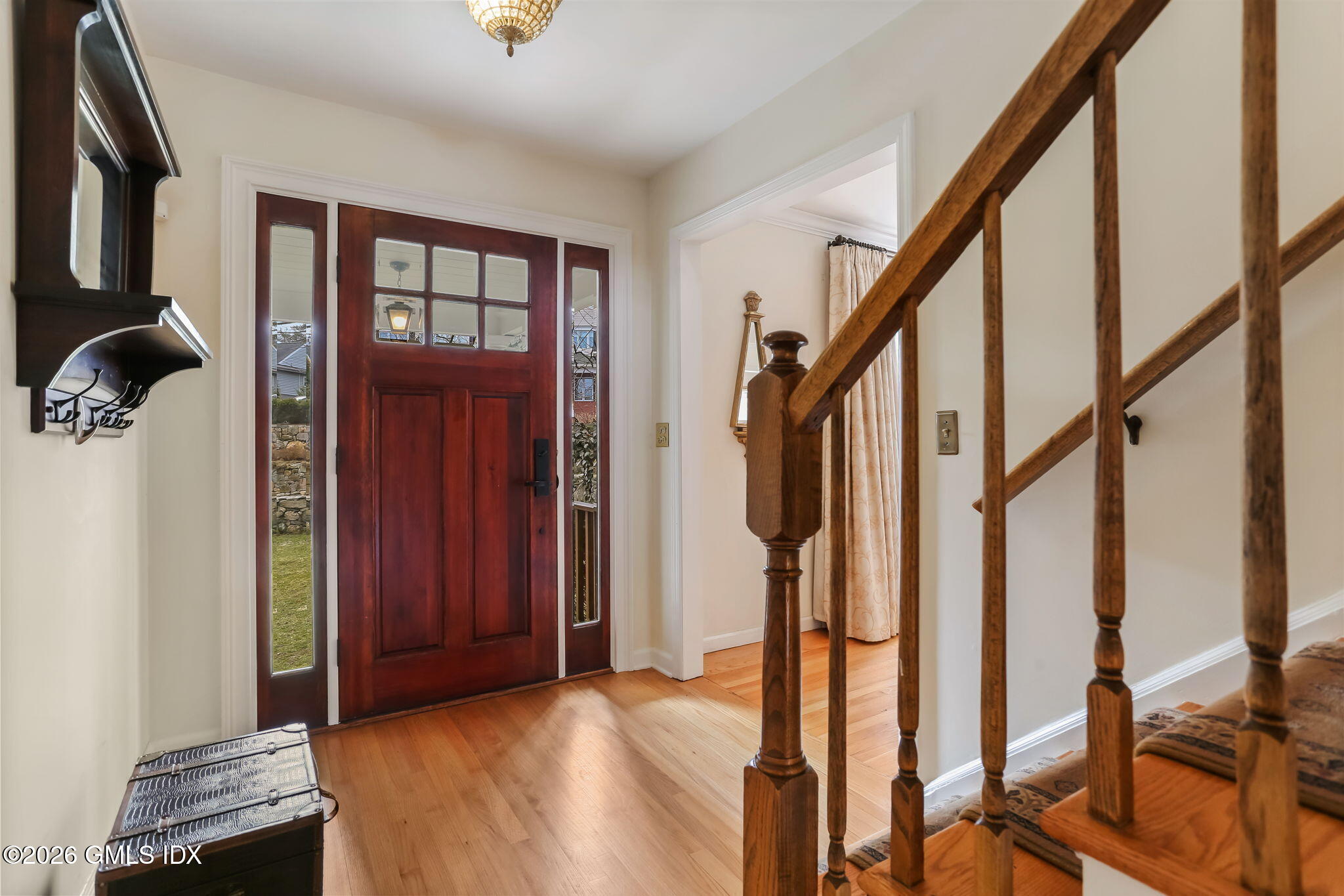 153 Lockwood Road Riverside, CT 06878 - Photo 5 of 58 a view of an entryway with staircase