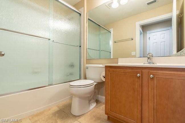 8623 Erice Court Naples, FL 34114 - Photo 28 of 37 a bathroom with a sink a toilet and shower