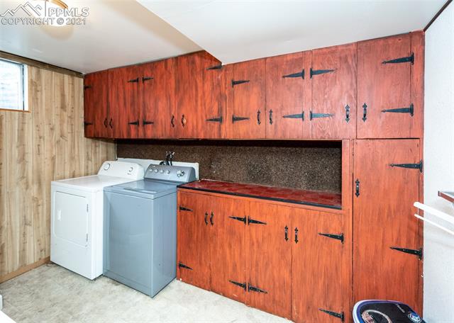 2208 North Chelton Road Colorado Springs, CO 80909 - Photo 22 of 24 Laundry room with built ins