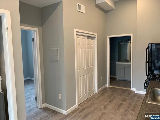 a view of a livingroom with a flat screen tv