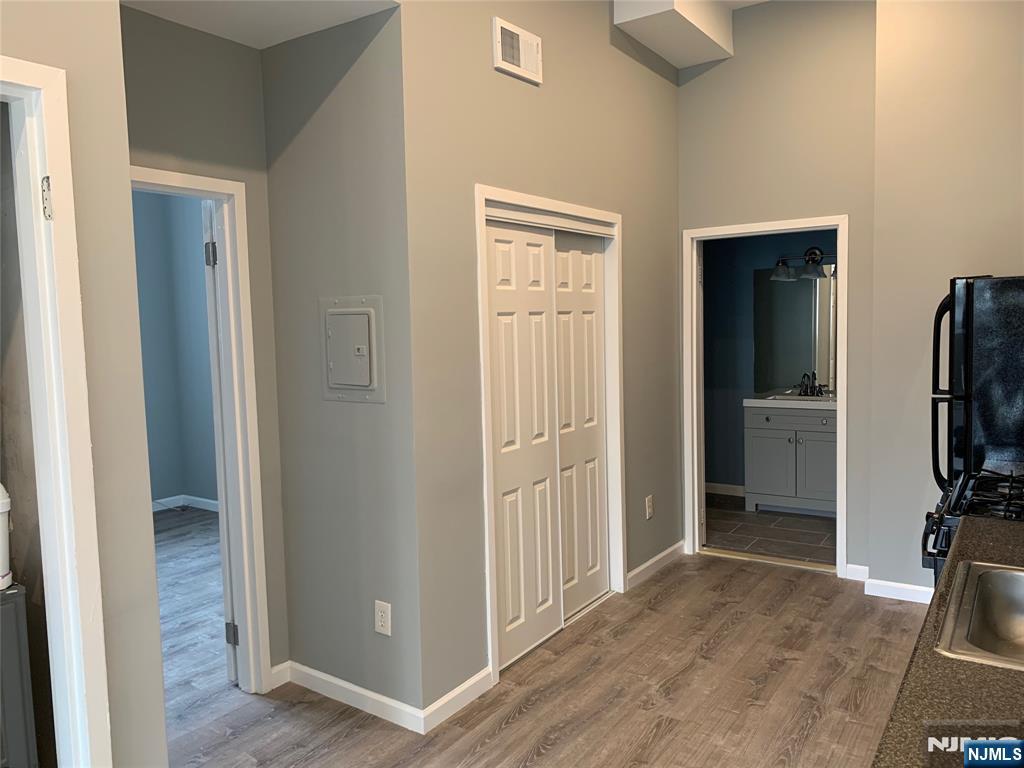 128 Locust Avenue, Unit A Wallington, NJ 07057 - Photo 4 of 13 a view of a livingroom with a flat screen tv