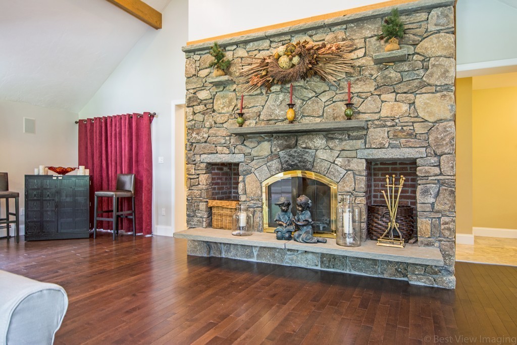 351 Reed Farm Road Boxborough, MA 01719 - Photo 11 of 30 a living room with furniture and a fireplace