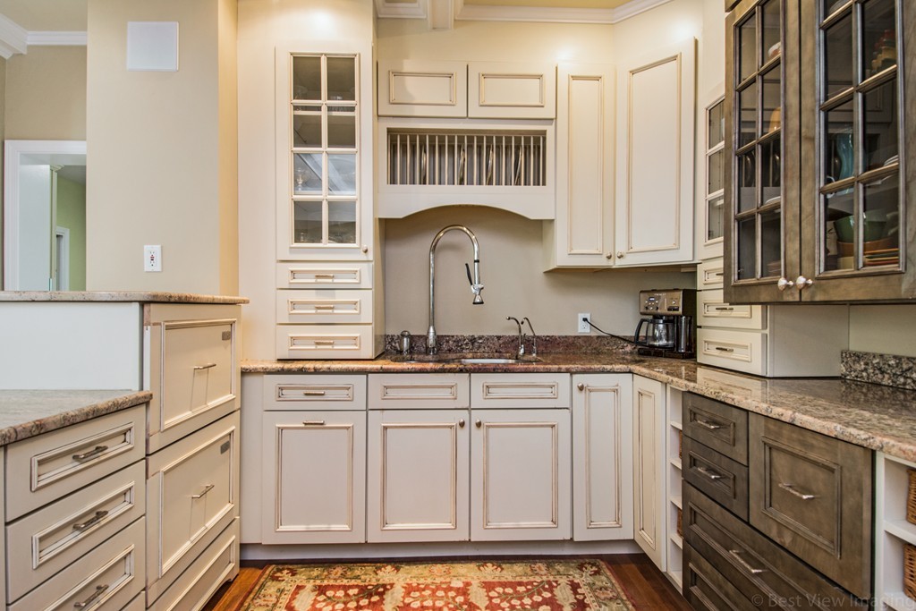 351 Reed Farm Road Boxborough, MA 01719 - Photo 5 of 30 a kitchen with stainless steel appliances granite countertop a sink and cabinets
