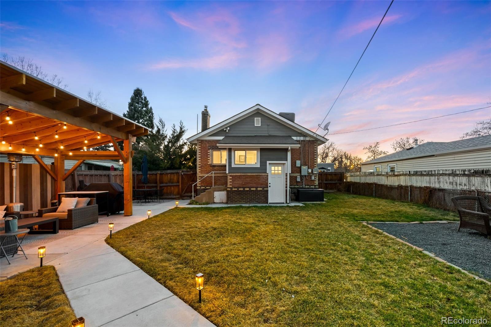 1032 Hooker Street Denver, CO 80204 - Photo 20 of 31 a view of a house with a yard