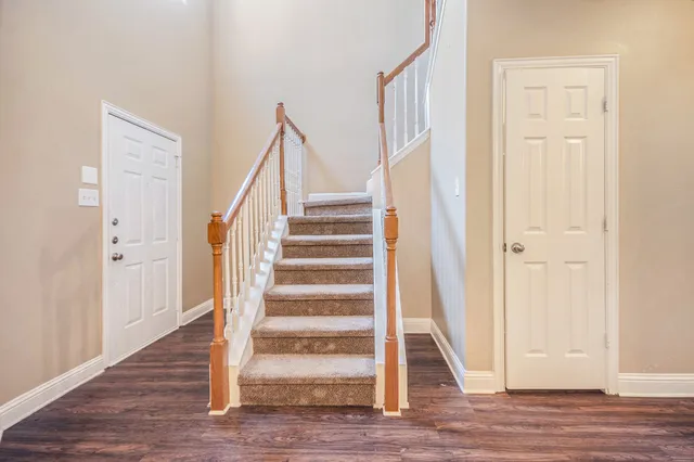 a view of entryway with wooden floor
