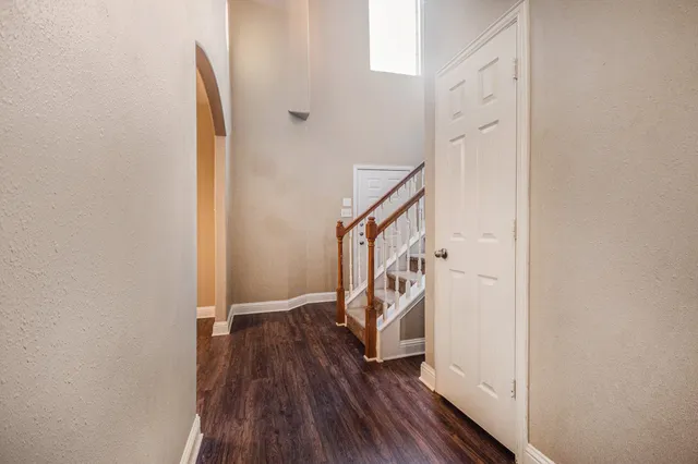 a view of entryway with wooden floor
