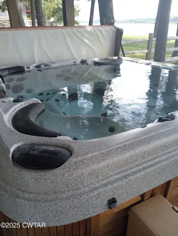 a view of swimming pool with patio