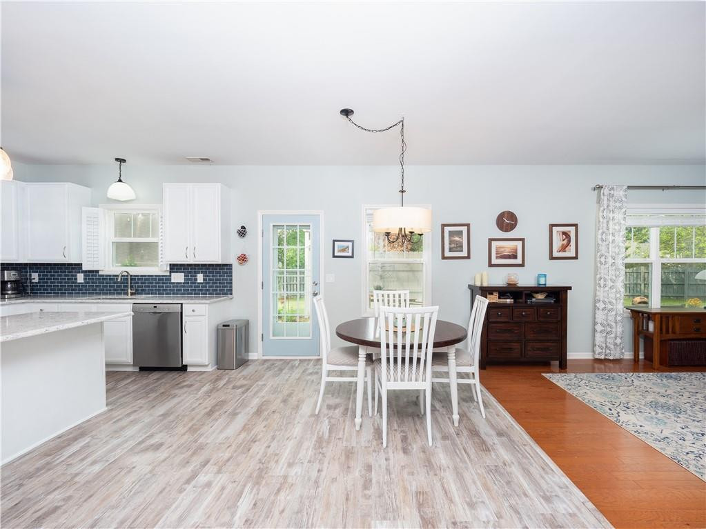 306 Green Pasture Road Mebane, NC 27302 - Photo 12 of 35 a dining room with furniture and wooden floor