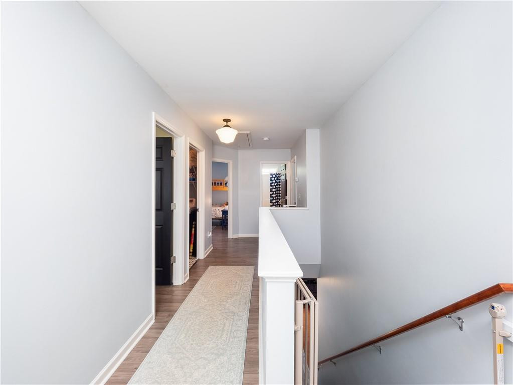 306 Green Pasture Road Mebane, NC 27302 - Photo 14 of 35 a view of a hallway with wooden floor and staircase