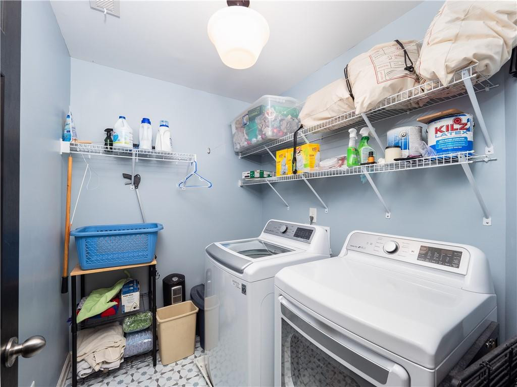 306 Green Pasture Road Mebane, NC 27302 - Photo 22 of 35 a utility room with dryer washer and other items