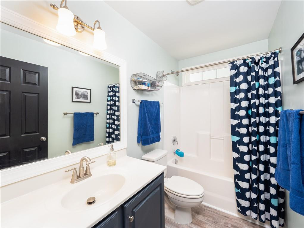 306 Green Pasture Road Mebane, NC 27302 - Photo 24 of 35 a bathroom with a sink a toilet a shower and a mirror