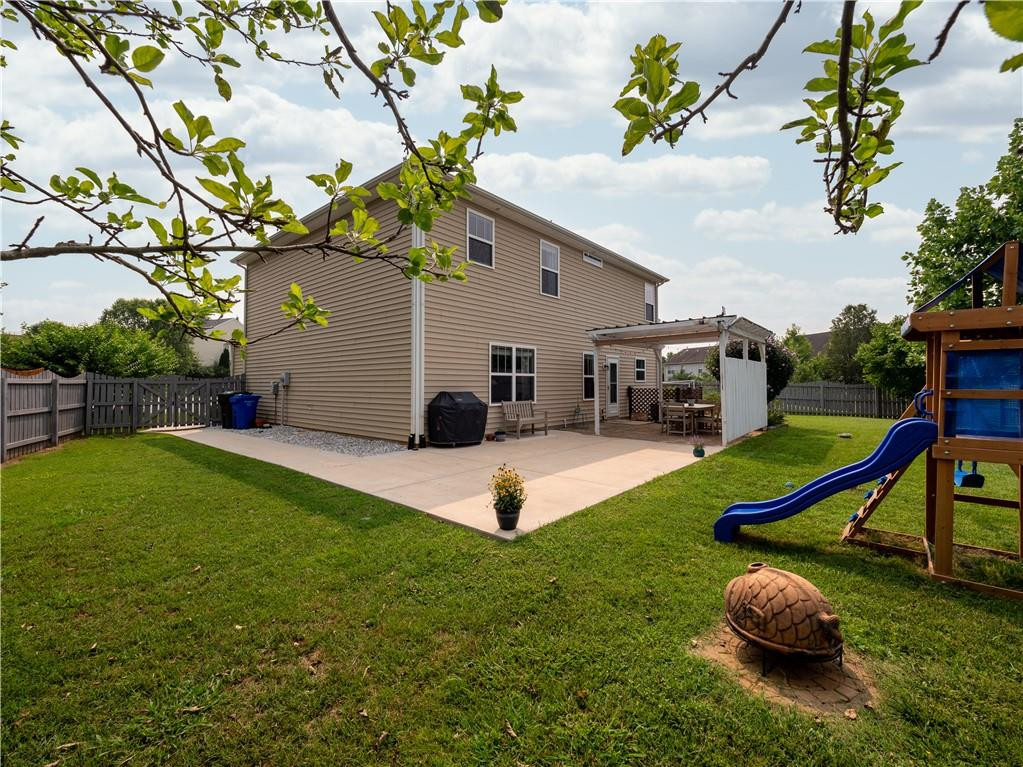 306 Green Pasture Road Mebane, NC 27302 - Photo 26 of 35 a view of a backyard with swimming pool