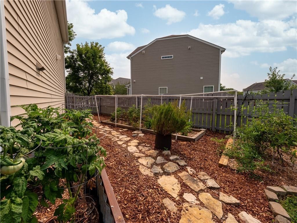 306 Green Pasture Road Mebane, NC 27302 - Photo 27 of 35 a backyard of a house with lots of green space