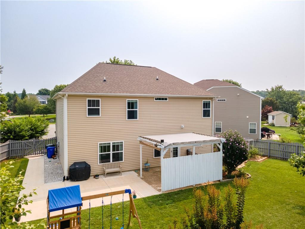 306 Green Pasture Road Mebane, NC 27302 - Photo 33 of 35 a aerial view of a house with swimming pool and sitting area