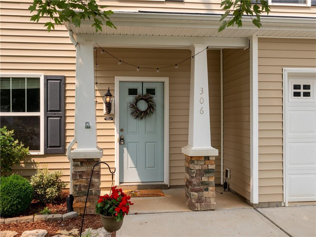 306 Green Pasture Road Mebane, NC 27302 - Photo 4 of 35 a front view of a house with a garage