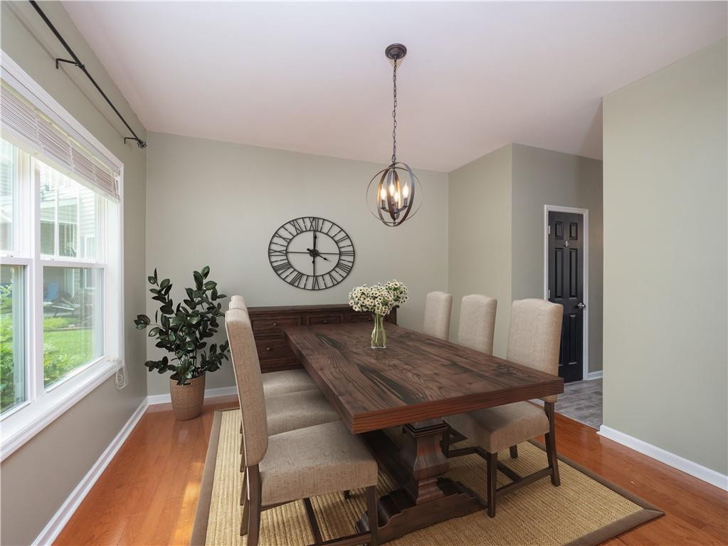 306 Green Pasture Road Mebane, NC 27302 - Photo 7 of 35 a view of a dining room with furniture window and wooden floor