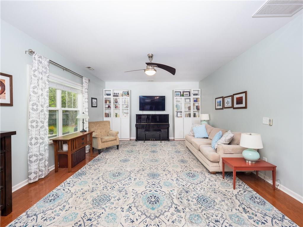 306 Green Pasture Road Mebane, NC 27302 - Photo 10 of 35 a living room with furniture and a flat screen tv