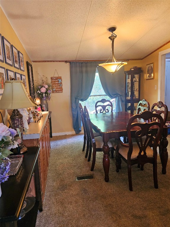 417 Hidden Oaks Drive Elgin, TX 78621 - Photo 13 of 26 a view of a dining room with furniture and chandelier