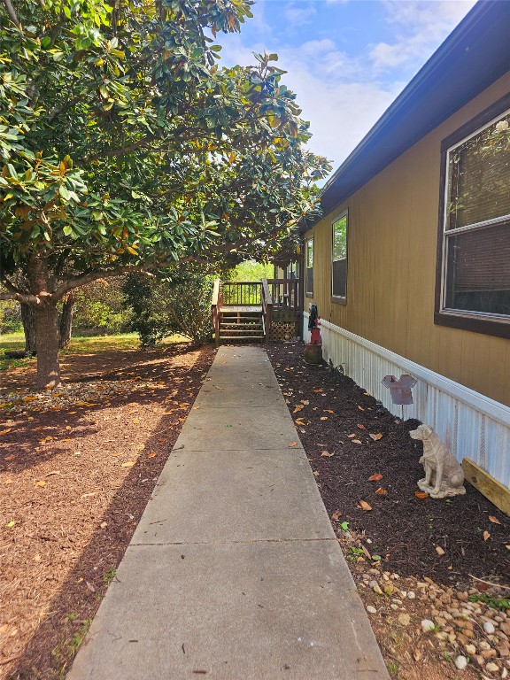 417 Hidden Oaks Drive Elgin, TX 78621 - Photo 2 of 26 a view of a backyard with pathway
