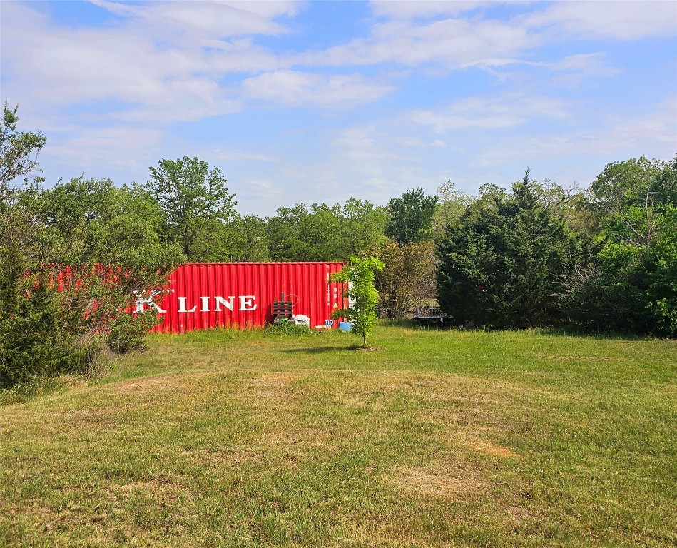 417 Hidden Oaks Drive Elgin, TX 78621 - Photo 25 of 26 a view of a field with an tree and fence