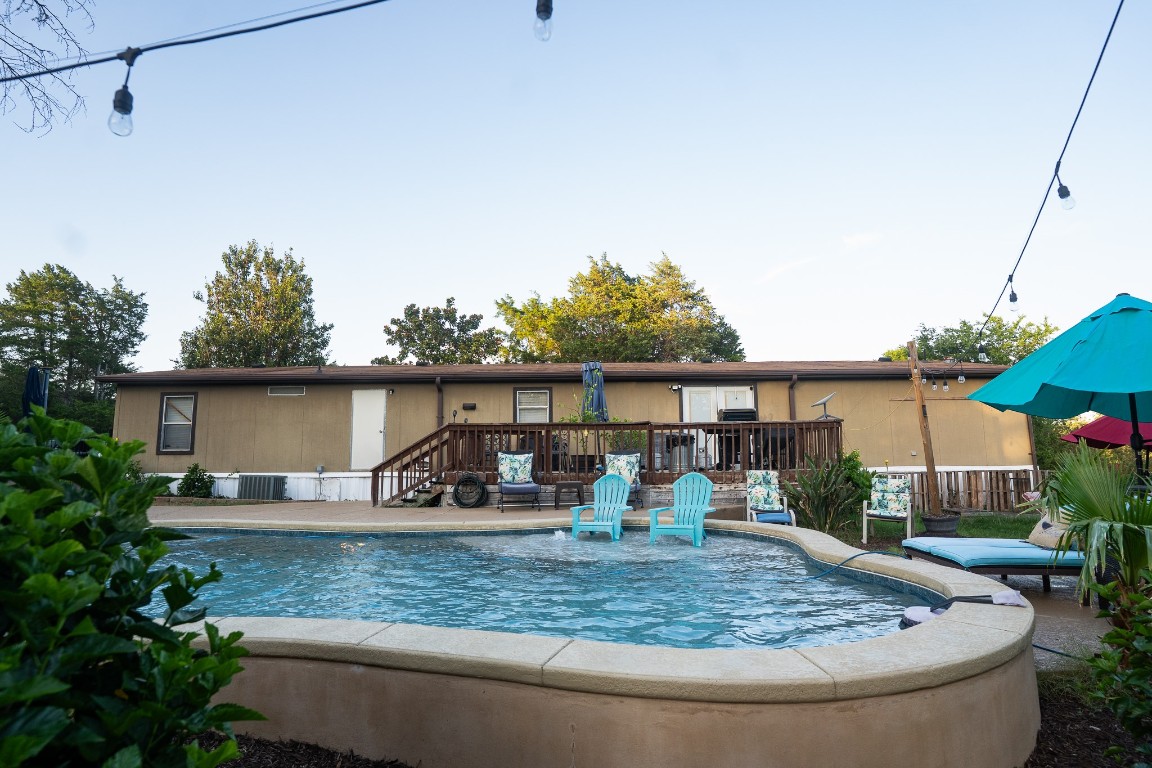 417 Hidden Oaks Drive Elgin, TX 78621 - Photo 9 of 26 a view of a house with a patio