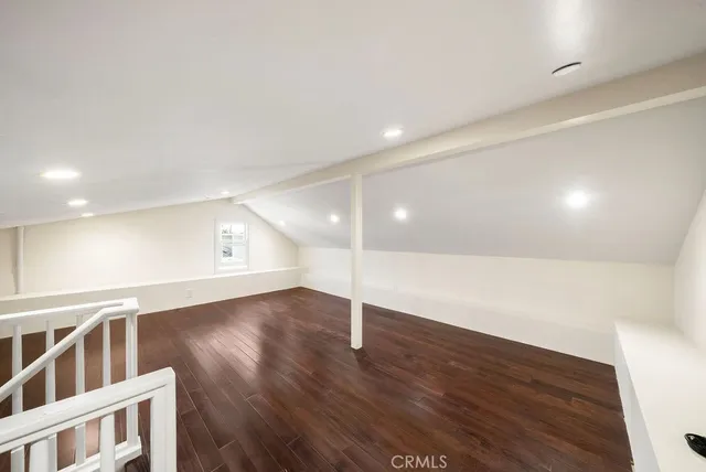 a view of a deck in front of house with a yard