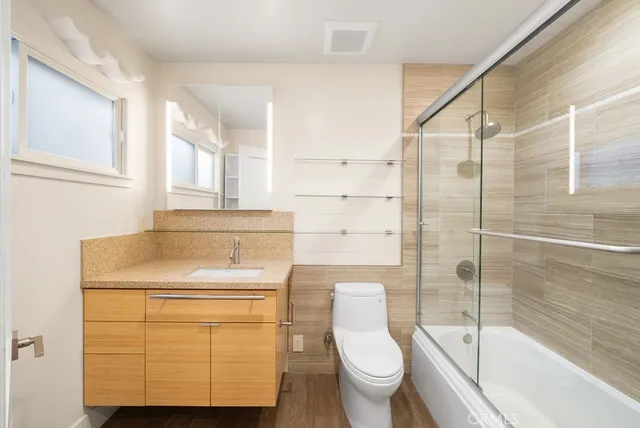 a view of a city with palm trees