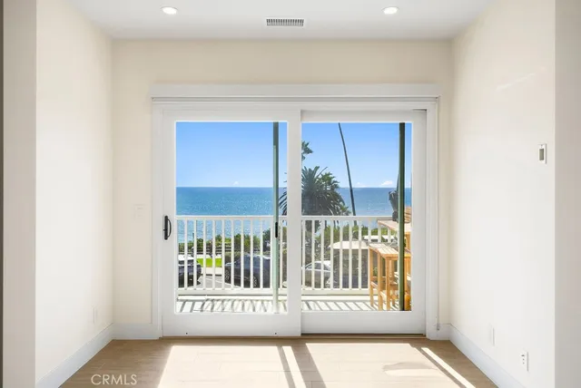 a view of a porch with a small yard