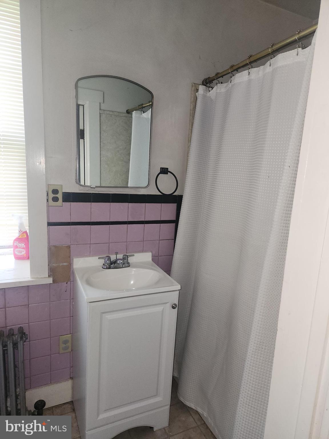 180 Range Road Mount Joy, PA 17552 - Photo 15 of 75 a bathroom with a sink a toilet and a mirror
