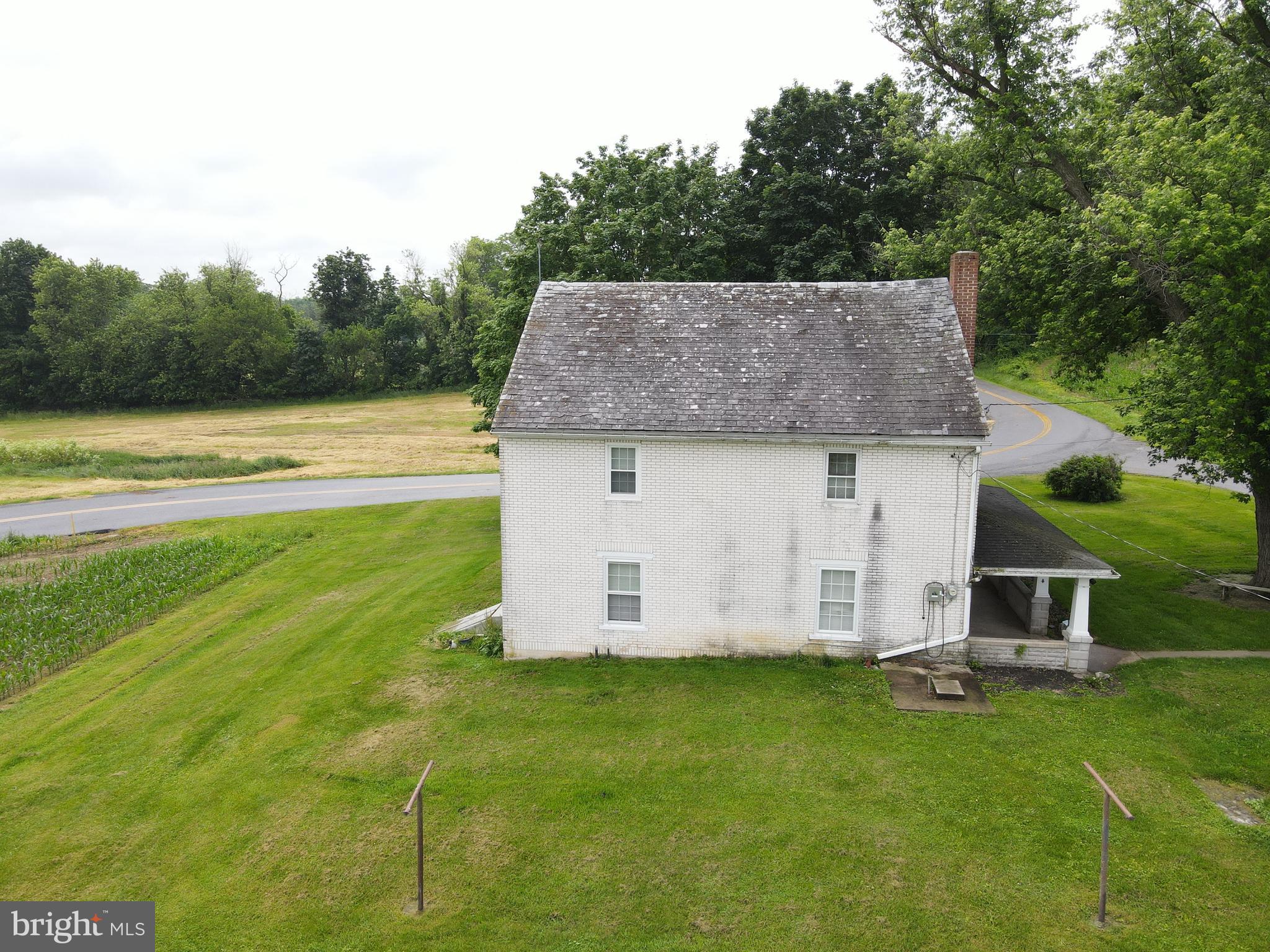 180 Range Road Mount Joy, PA 17552 - Photo 2 of 75 a aerial view of a house with swimming pool and a yard