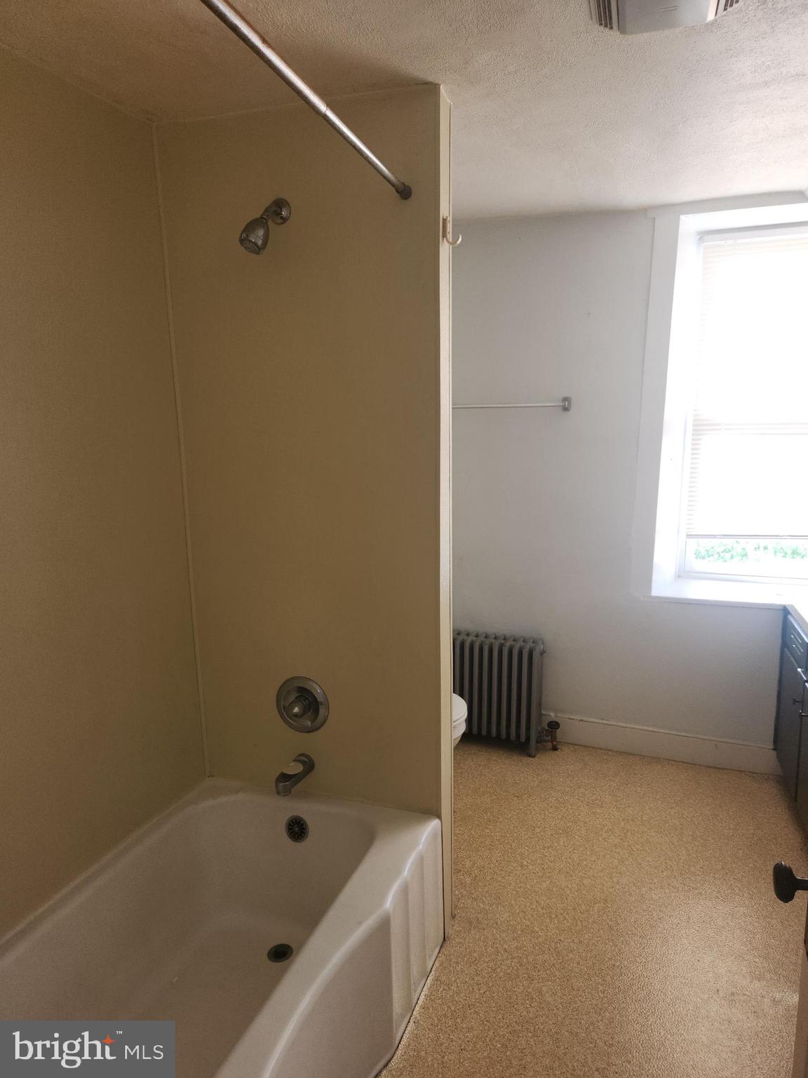 180 Range Road Mount Joy, PA 17552 - Photo 21 of 75 a bathroom with a bathtub and a window