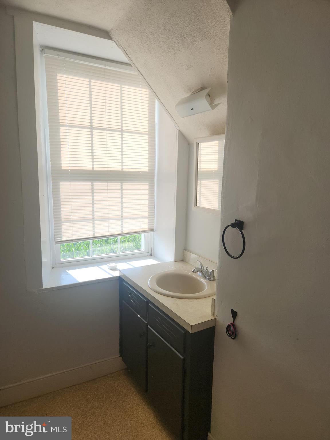 180 Range Road Mount Joy, PA 17552 - Photo 22 of 75 a bathroom with a sink and a window