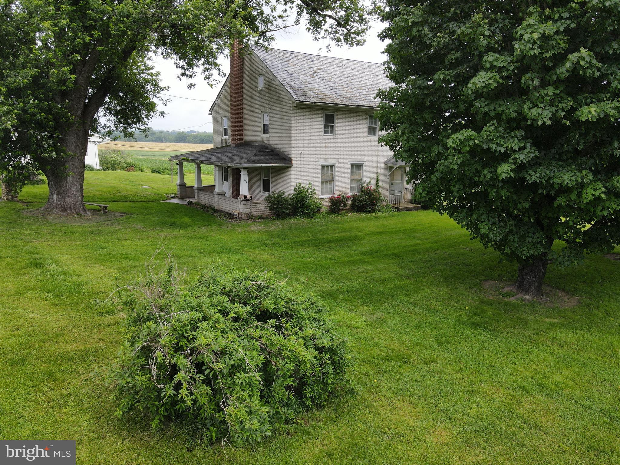 180 Range Road Mount Joy, PA 17552 - Photo 60 of 75 a view of a house with a yard plants and large tree