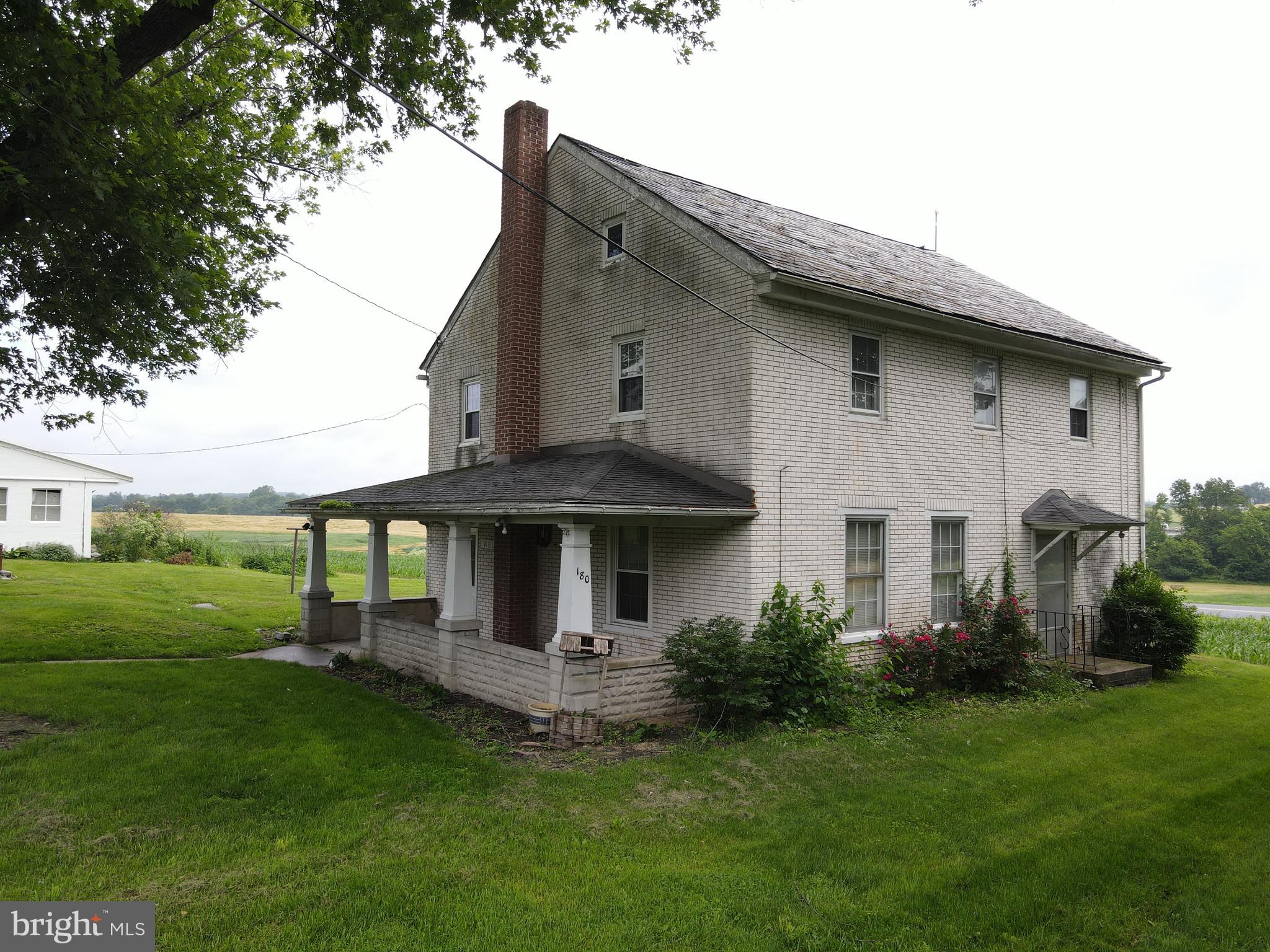 180 Range Road Mount Joy, PA 17552 - Photo 62 of 75 a front view of a house with a garden