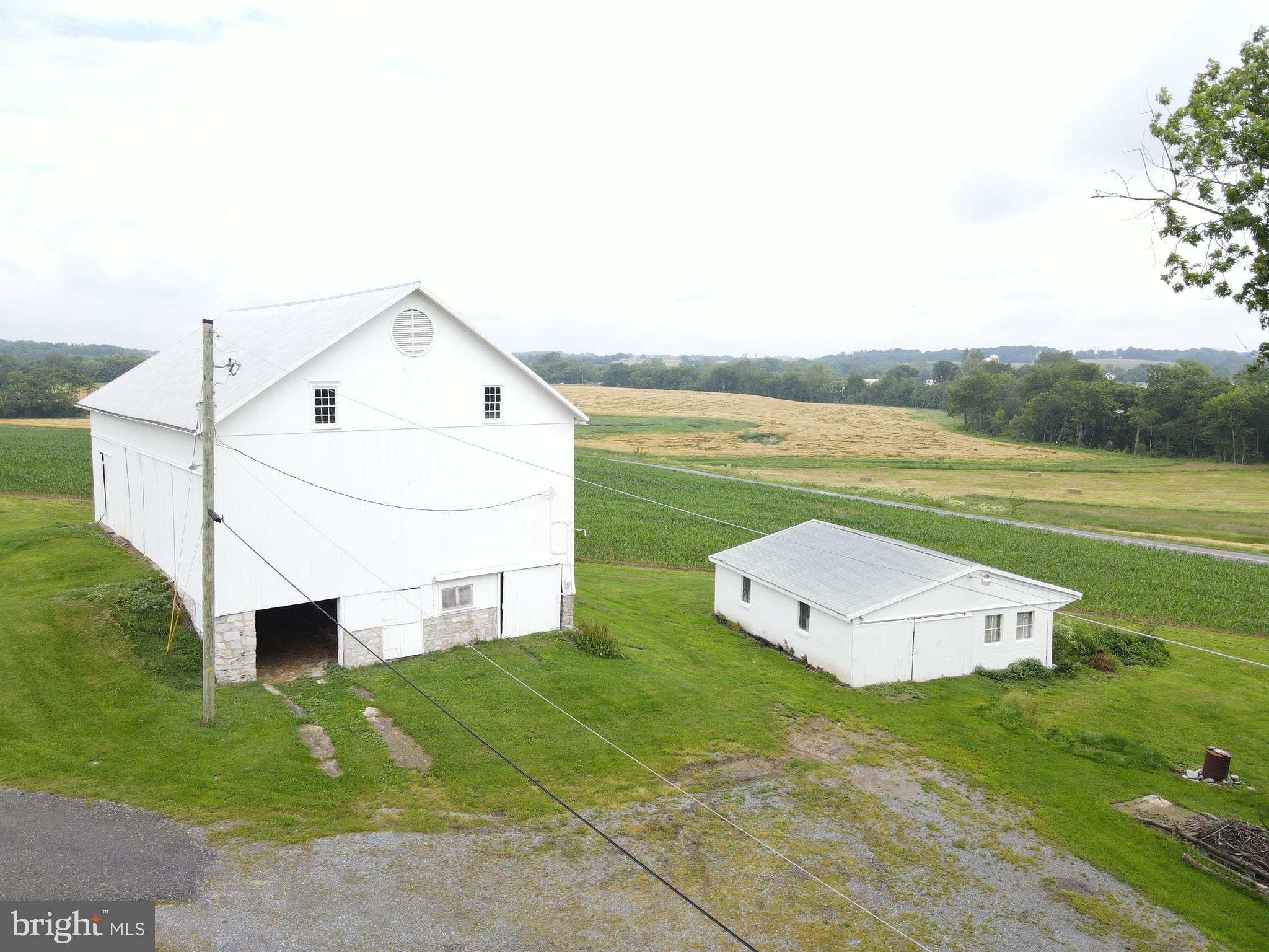 180 Range Road Mount Joy, PA 17552 - Photo 65 of 75 a view of a house with a yard and a garden