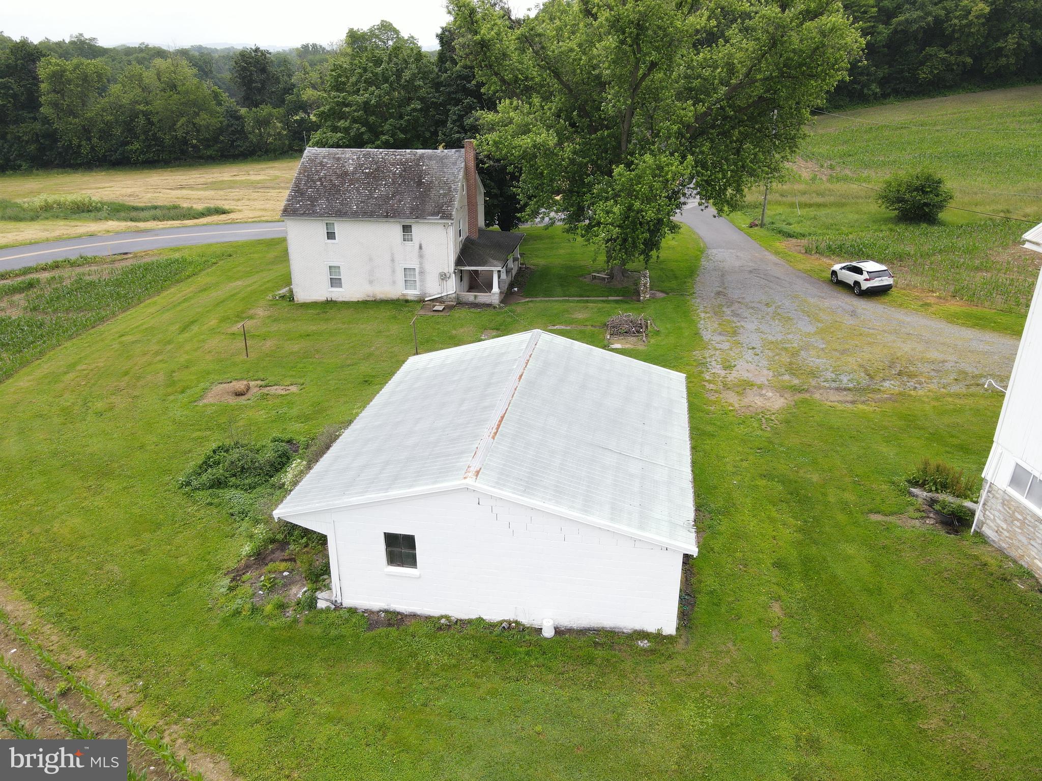 180 Range Road Mount Joy, PA 17552 - Photo 72 of 75 an aerial view of a house with a yard and lake view