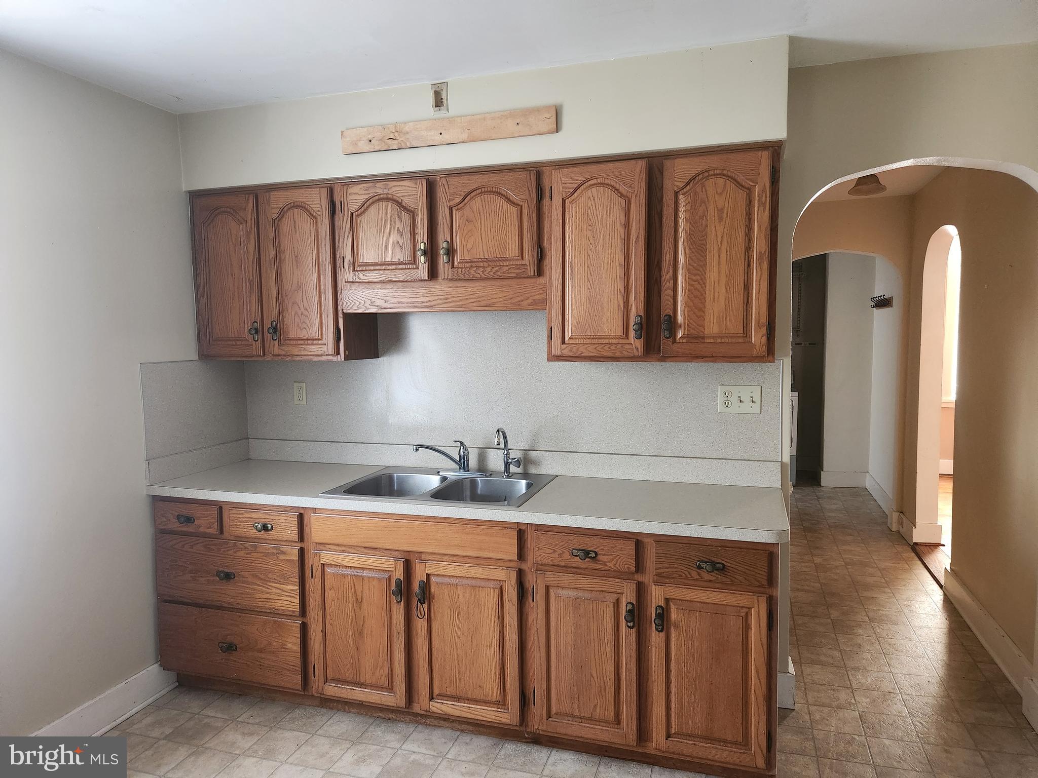 180 Range Road Mount Joy, PA 17552 - Photo 9 of 75 a kitchen with stainless steel appliances granite countertop a sink and wooden cabinets