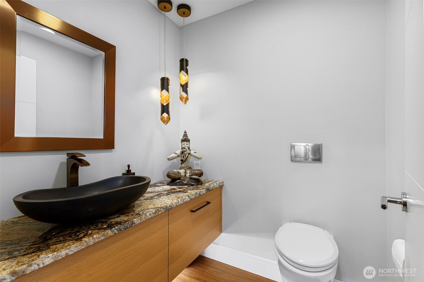 1571 Thorndyke Road Port Ludlow, WA 98365 - Photo 17 of 40 a bathroom with a granite countertop toilet sink and mirror