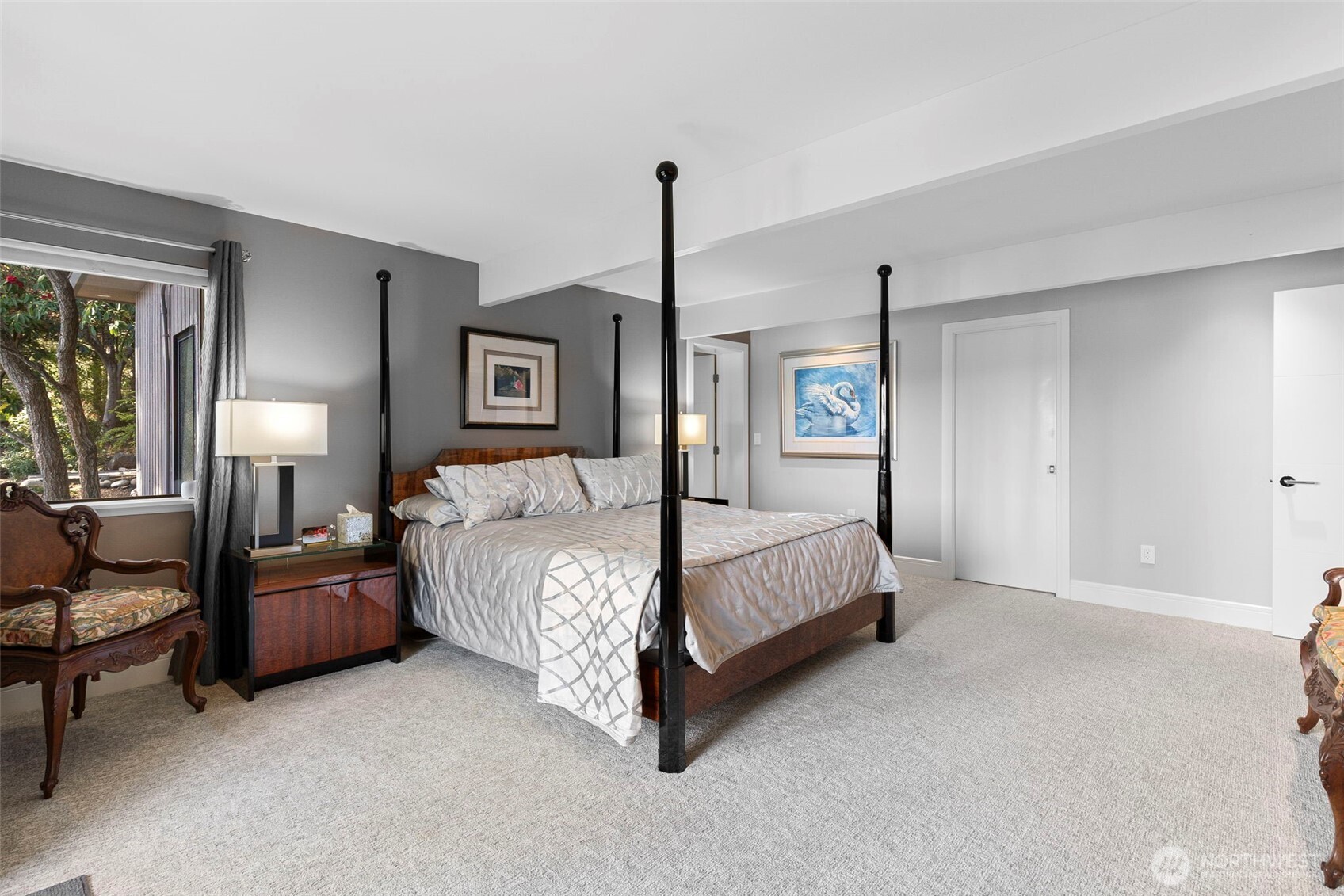 1571 Thorndyke Road Port Ludlow, WA 98365 - Photo 21 of 40 a bedroom with a bed lamp and window