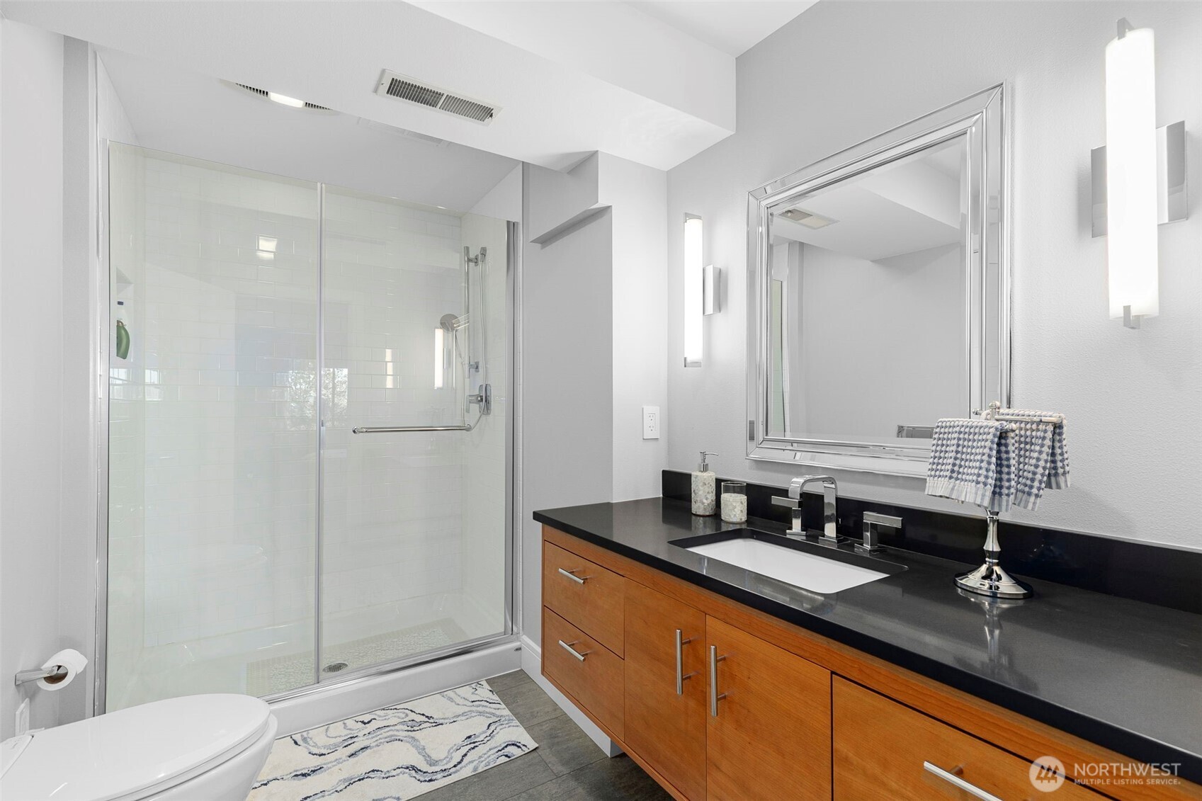 1571 Thorndyke Road Port Ludlow, WA 98365 - Photo 25 of 40 a bathroom with a granite countertop sink mirror and double
