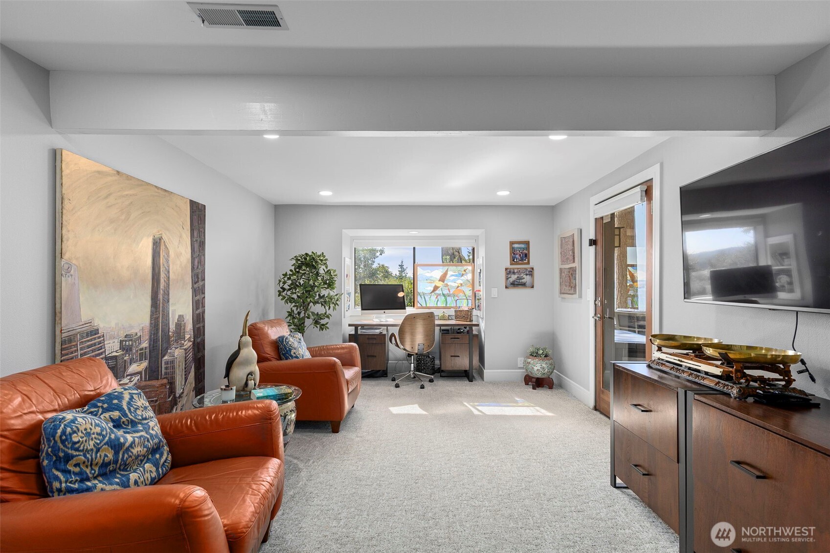 1571 Thorndyke Road Port Ludlow, WA 98365 - Photo 26 of 40 a living room with furniture and a flat screen tv