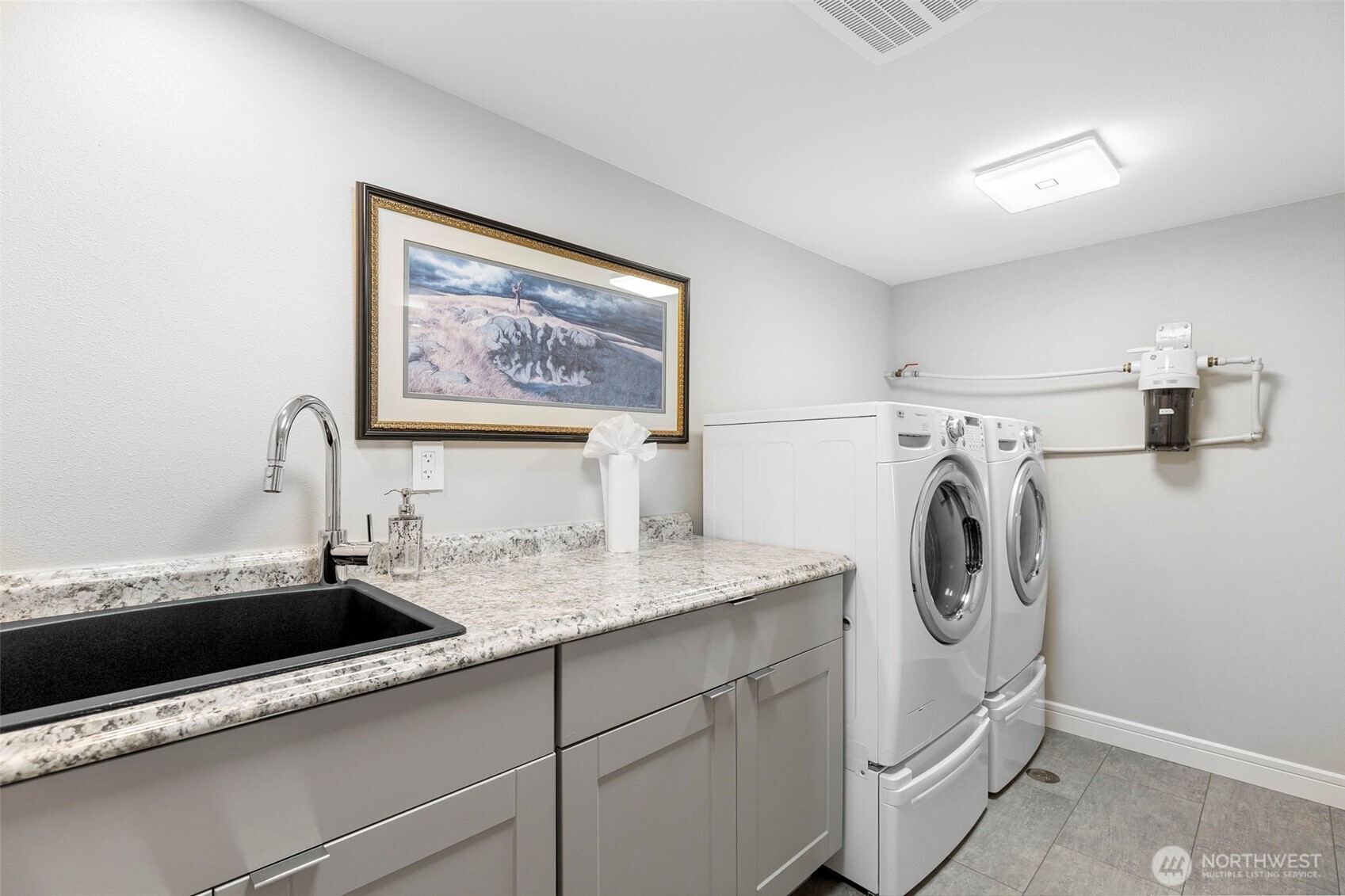 1571 Thorndyke Road Port Ludlow, WA 98365 - Photo 28 of 40 a utility room with dryer and washer