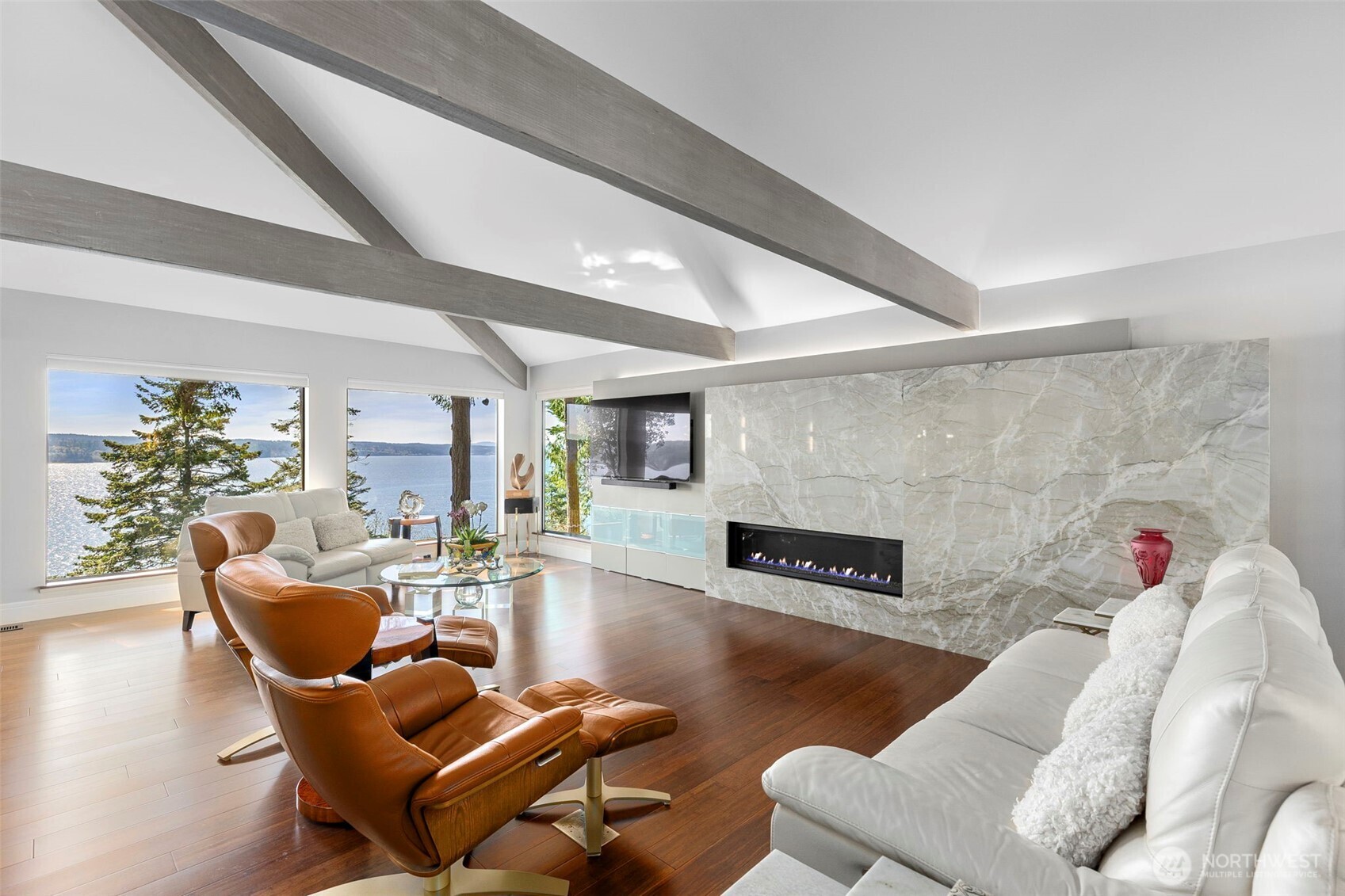 1571 Thorndyke Road Port Ludlow, WA 98365 - Photo 3 of 40 a living room with furniture and a fireplace