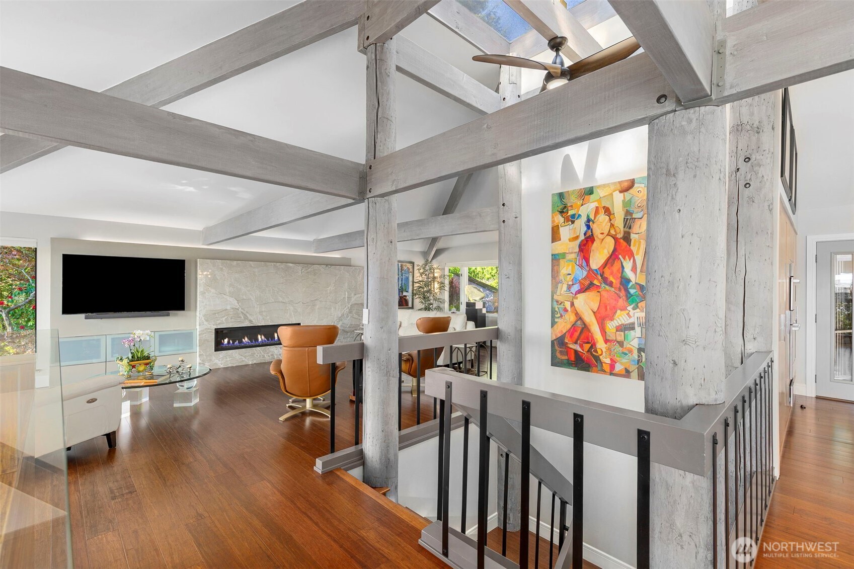 1571 Thorndyke Road Port Ludlow, WA 98365 - Photo 7 of 40 a view of a room with wooden floor windows table and chairs