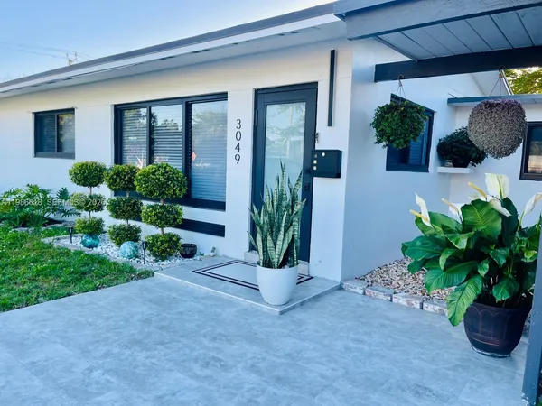a view of a entryway door front of house