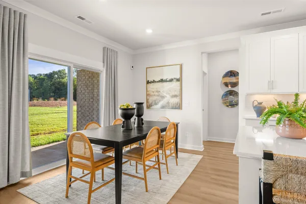 a spacious bathroom with a sink and a mirror